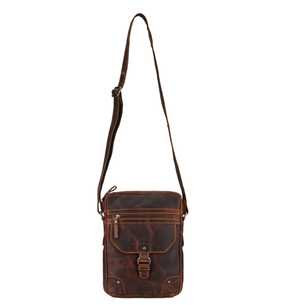 Minori Leather Denver leather crossbody bag in chestnut color, unisex design with adjustable strap and front pocket detail.