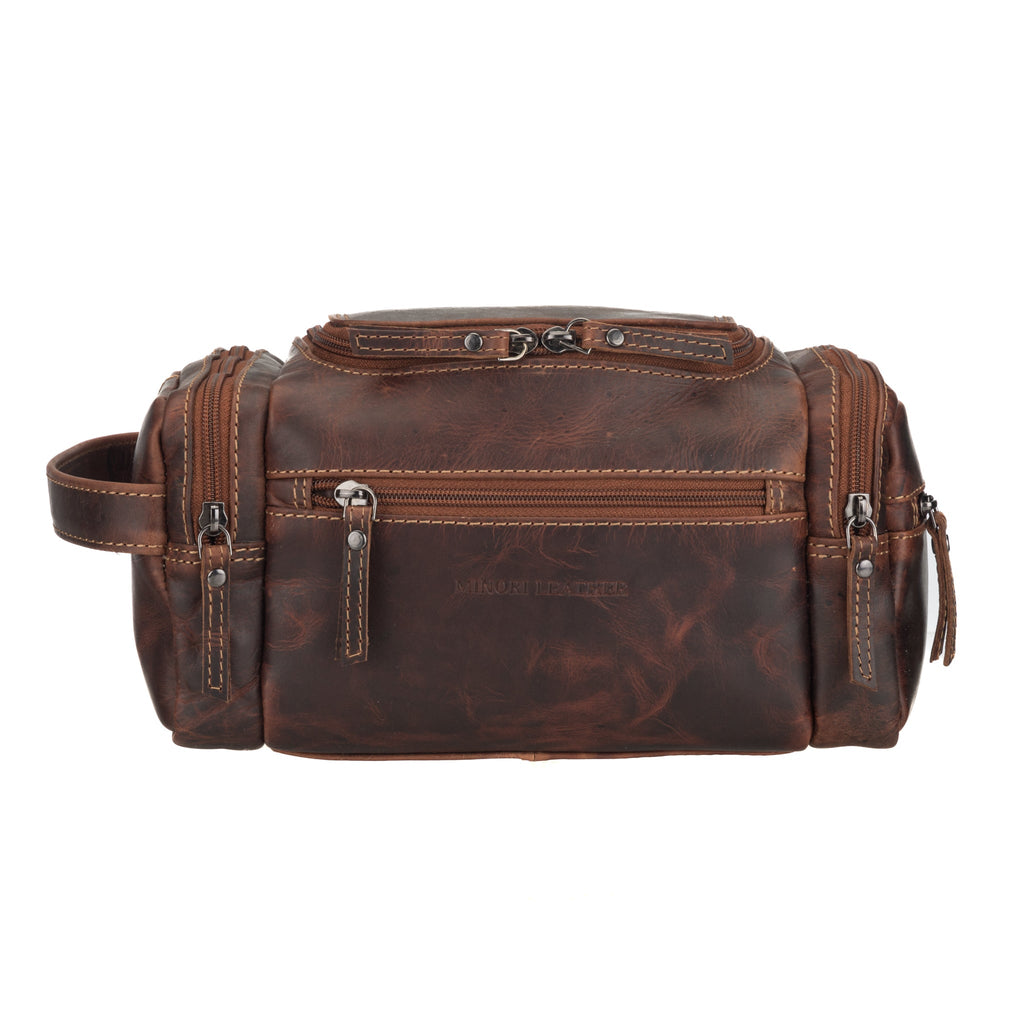 Minori Leather Winston men's premium chestnut leather toiletry bag with zipper and handle for travel storage.