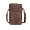 Minori Leather Ashford leather sling bag in chestnut, unisex design with adjustable strap and stylish exterior.