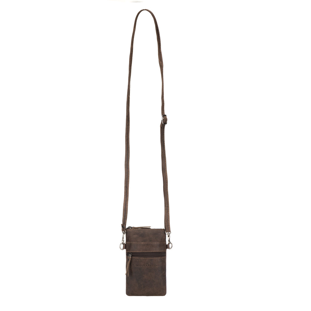 Minori Leather Ashford leather sling bag in brown with adjustable strap, unisex design, stylish and functional accessory.