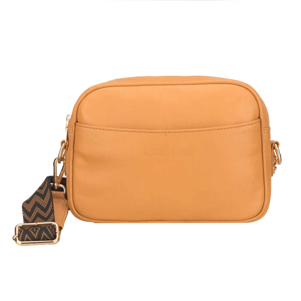Tan Evelyn leather crossbody bag for women by Minori Leather, featuring a sleek design and adjustable strap.