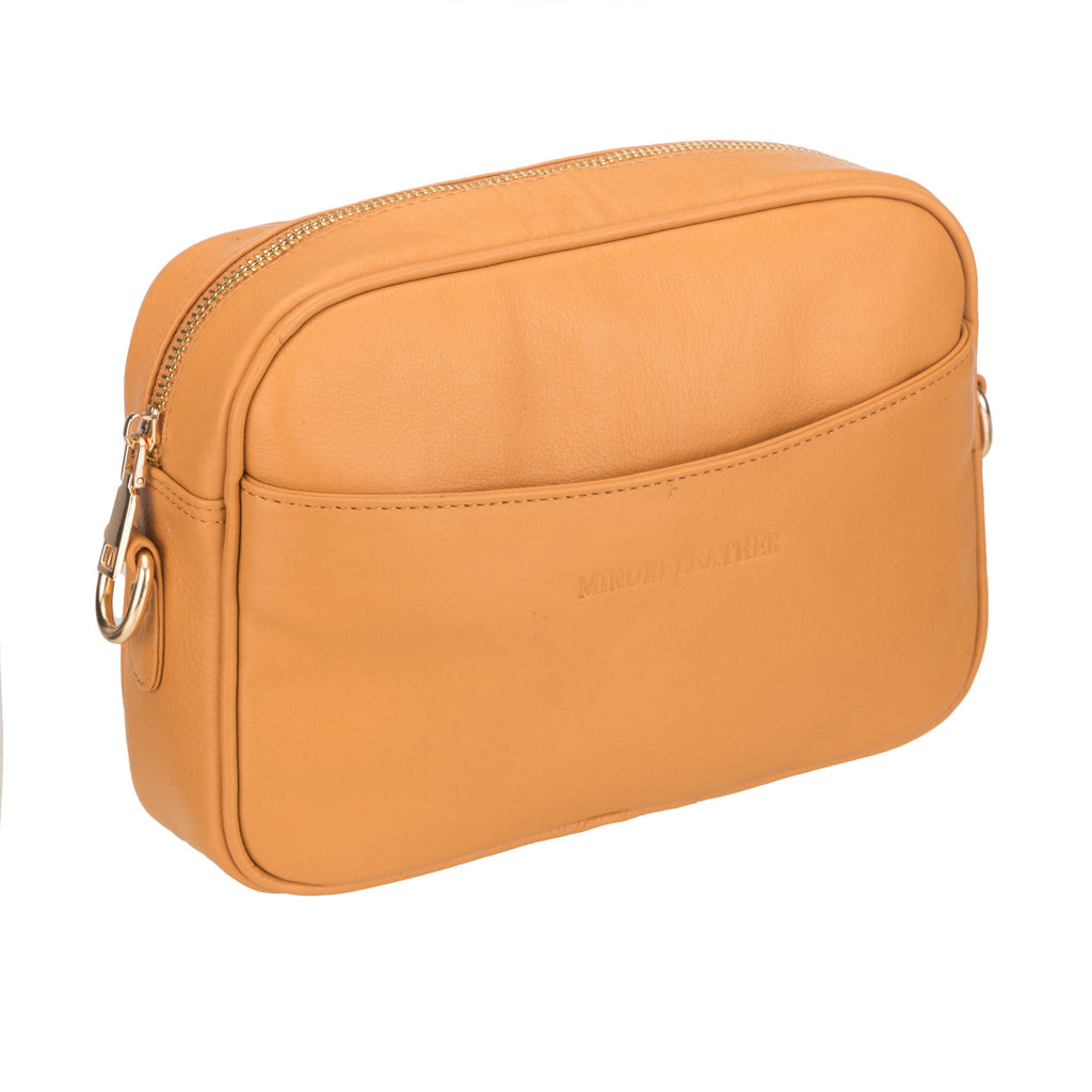 Tan Evelyn leather crossbody bag for women by Minori Leather, featuring a sleek design and adjustable strap.