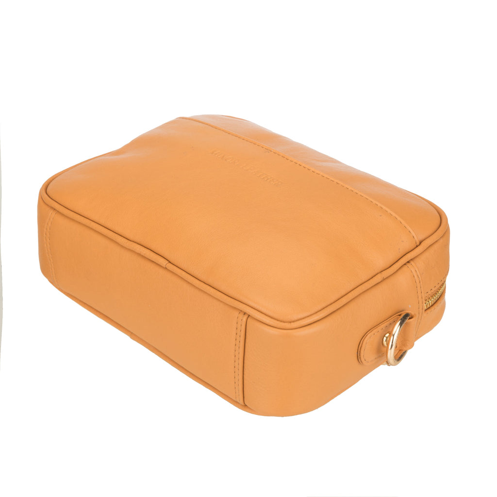 Tan Evelyn leather crossbody bag for women by Minori Leather, featuring a sleek design and adjustable strap.