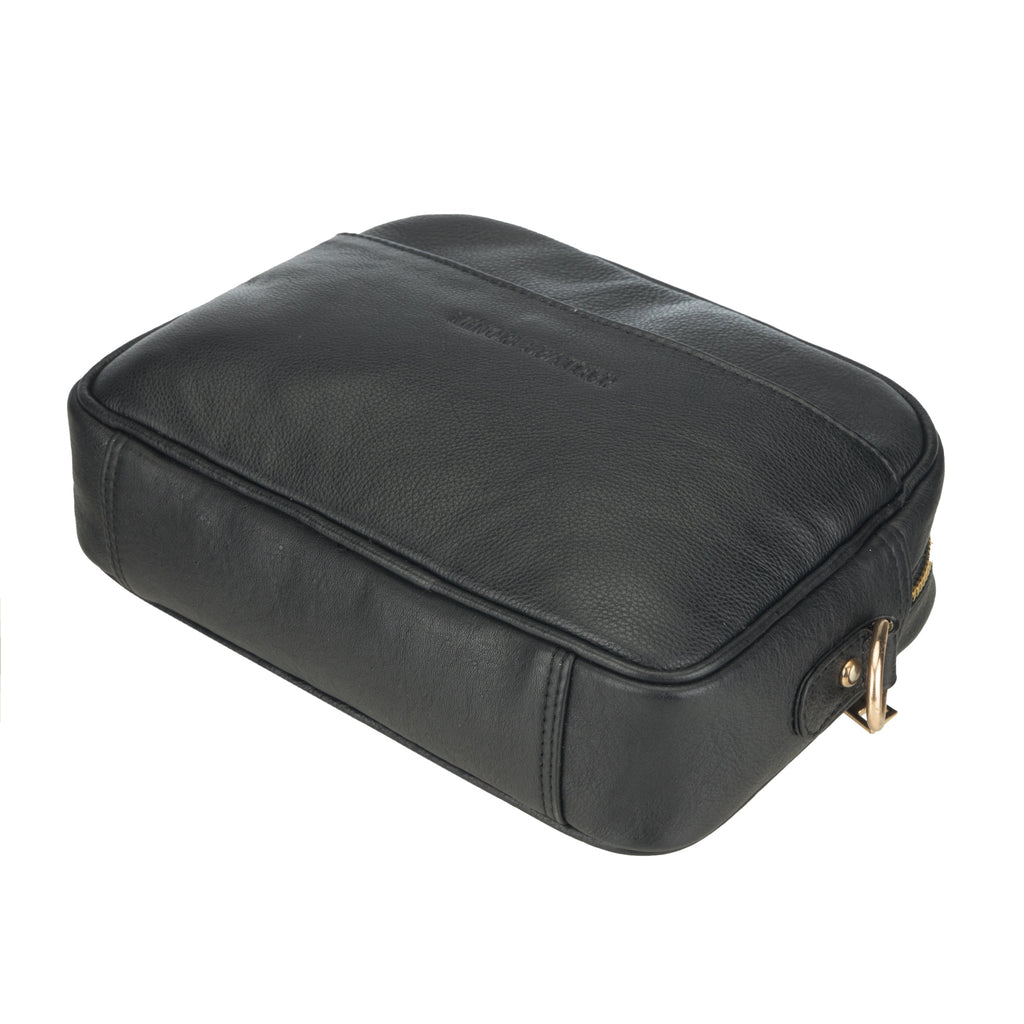 Black Evelyn leather crossbody bag for women by Minori Leather, showcasing sleek design and adjustable strap.