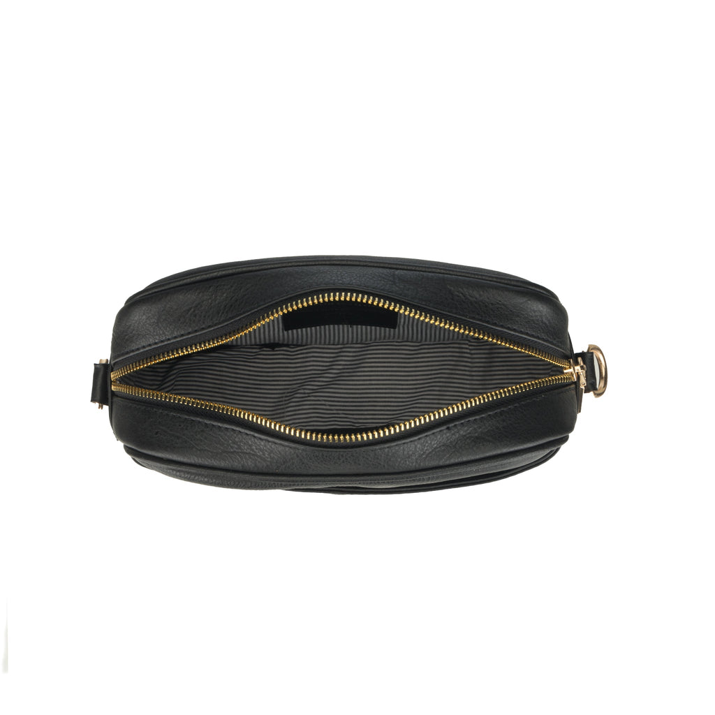 Black Evelyn Leather Crossbody Bag for women by Minori Leather, featuring a sleek, compact design with adjustable strap and premium leather.