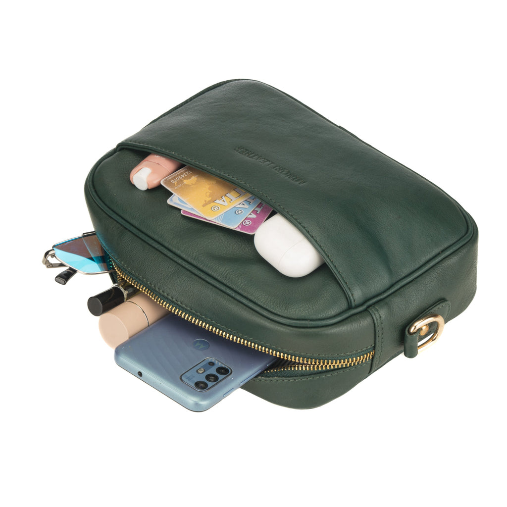 Forest green Evelyn leather crossbody bag for women by Minori Leather, featuring a sleek, compact design with adjustable strap.