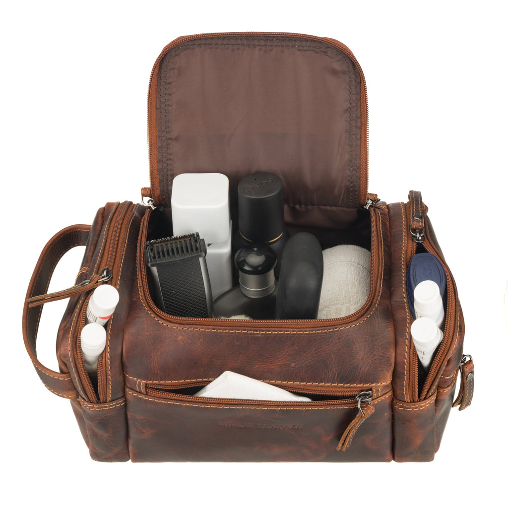 Minori Leather Winston men's premium chestnut leather toiletry bag with zipper and compact design for travel accessories.