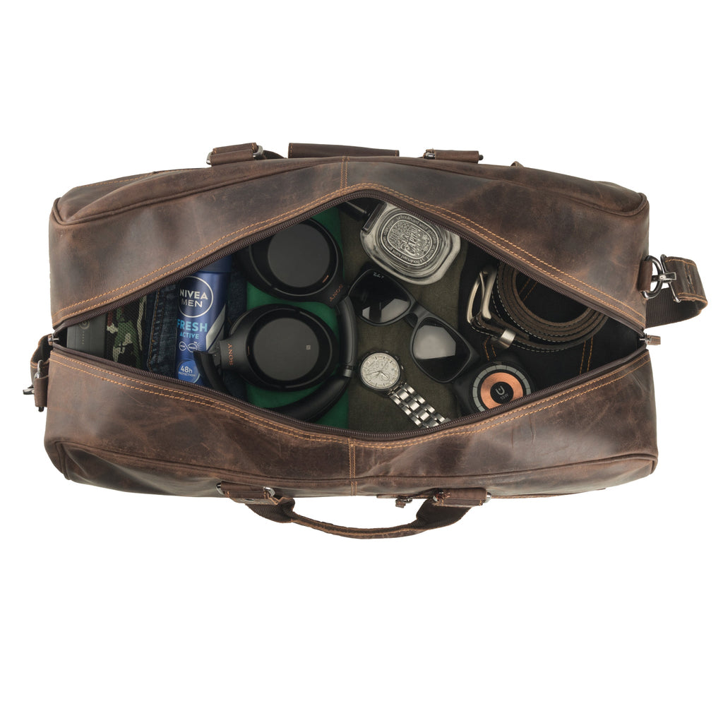 Brown Minori Leather Hudson leather duffle bag for men and women, featuring sturdy handles and spacious interior.