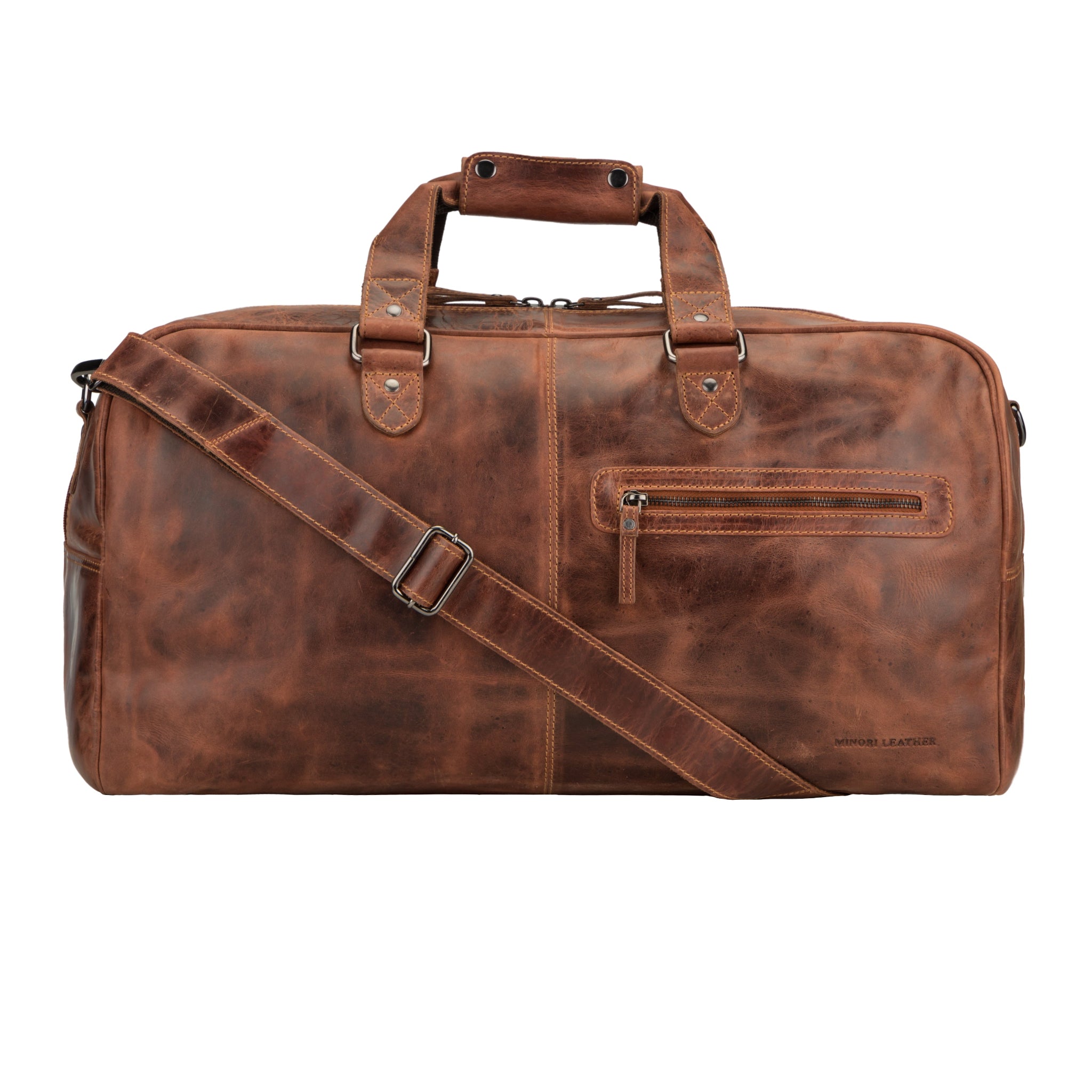 Minori Leather Hudson unisex chestnut leather duffle bag with sturdy handles and spacious interior, ideal for travel and weekend trips.
