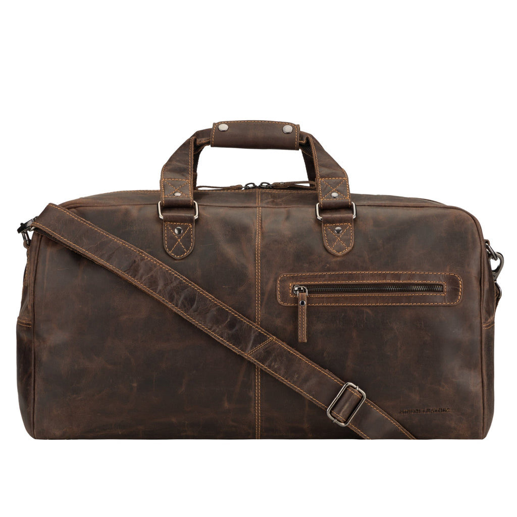 Minori Leather Hudson unisex brown leather duffle bag with sturdy handles and spacious interior for travel or weekend trips.