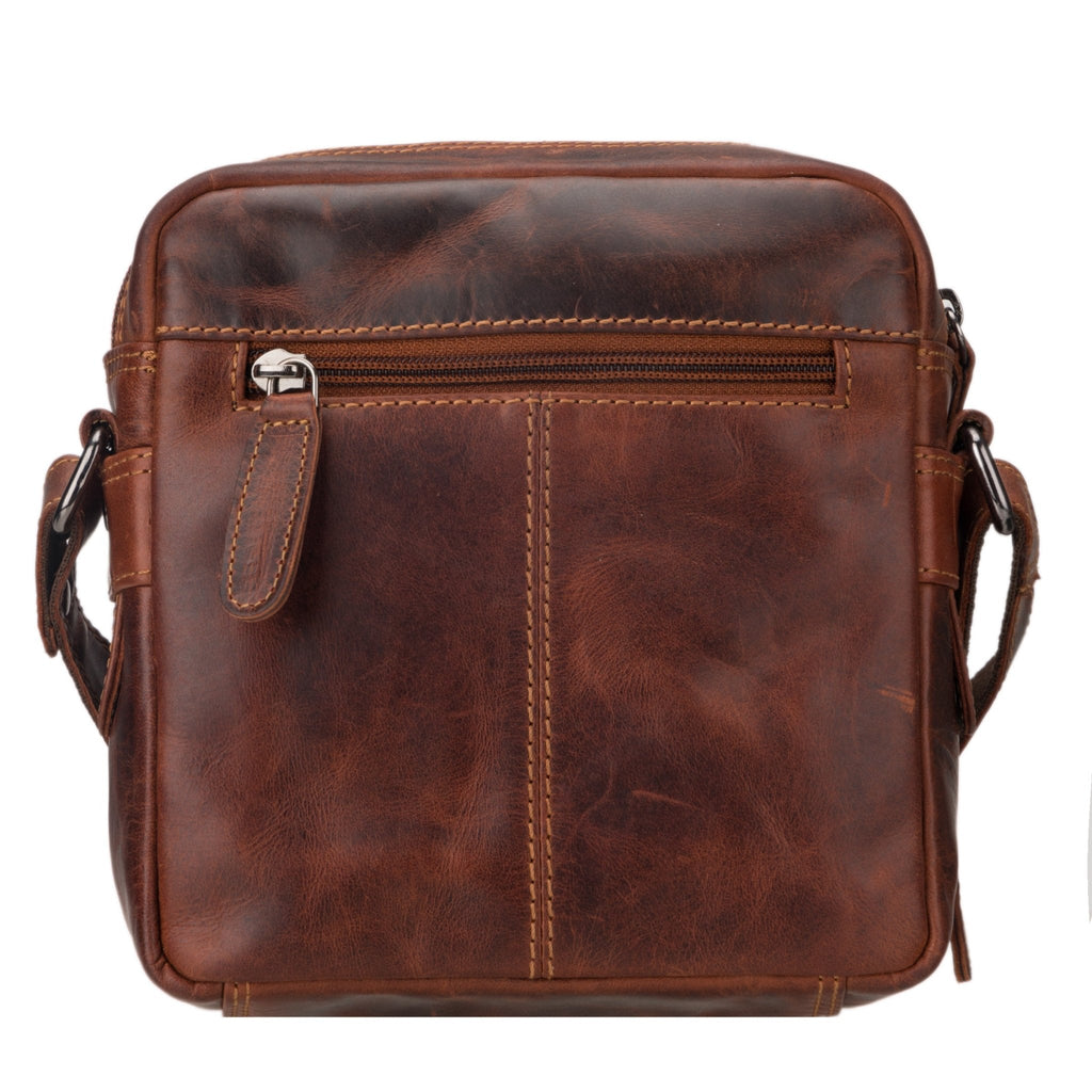 Minori Leather Cove Leather Crossbody Bag in chestnut with adjustable strap and multiple compartments.