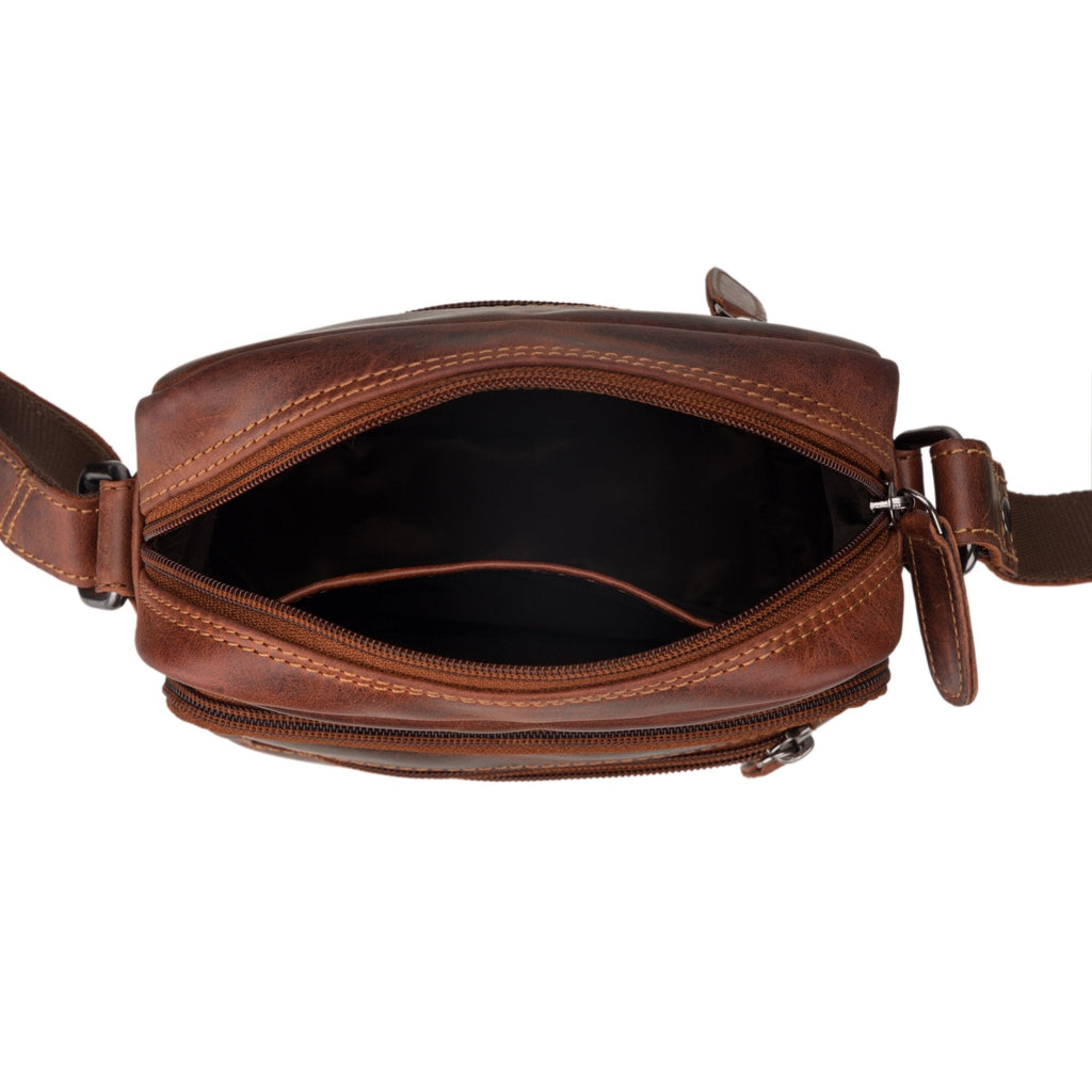 Minori Leather Cove leather crossbody bag in chestnut, featuring a compact design with adjustable strap and minimalist style.