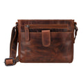 Minori Leather unisex chestnut leather crossbody bag with adjustable strap and minimalist design.