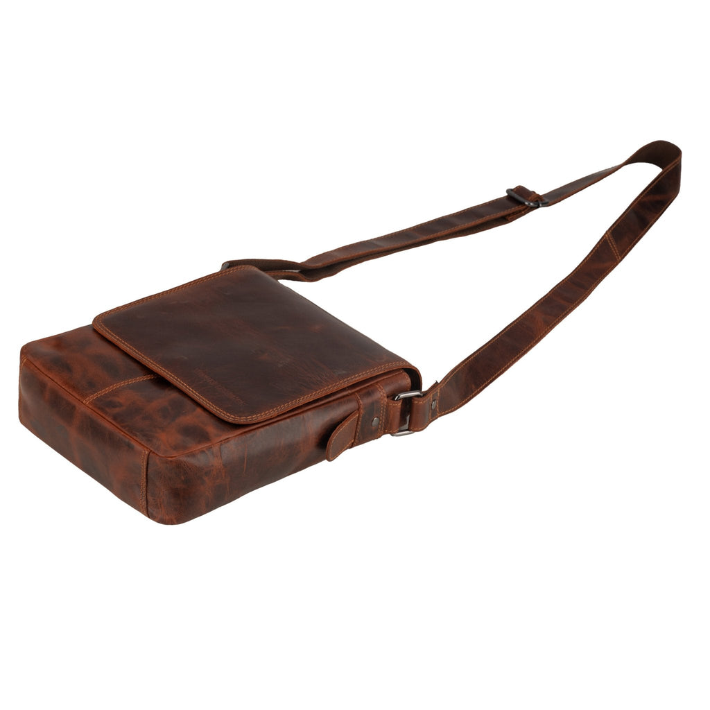 Minori Leather Halifax leather crossbody bag in chestnut with adjustable strap and front pocket, stylish and functional accessory.