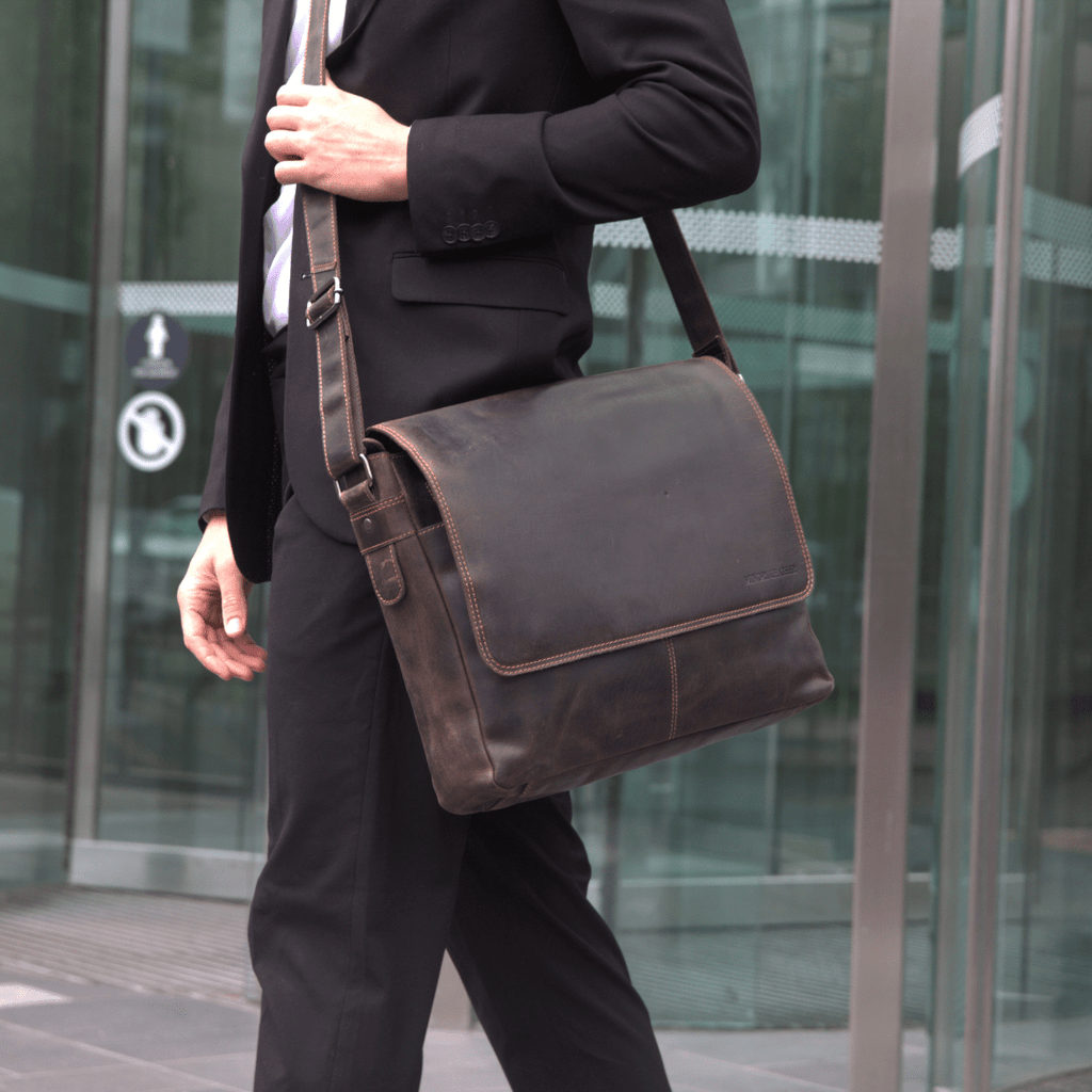 Richmond full grain leather 16-inch men's laptop messenger bag in brown by Minori Leather, with adjustable strap and front pocket.
