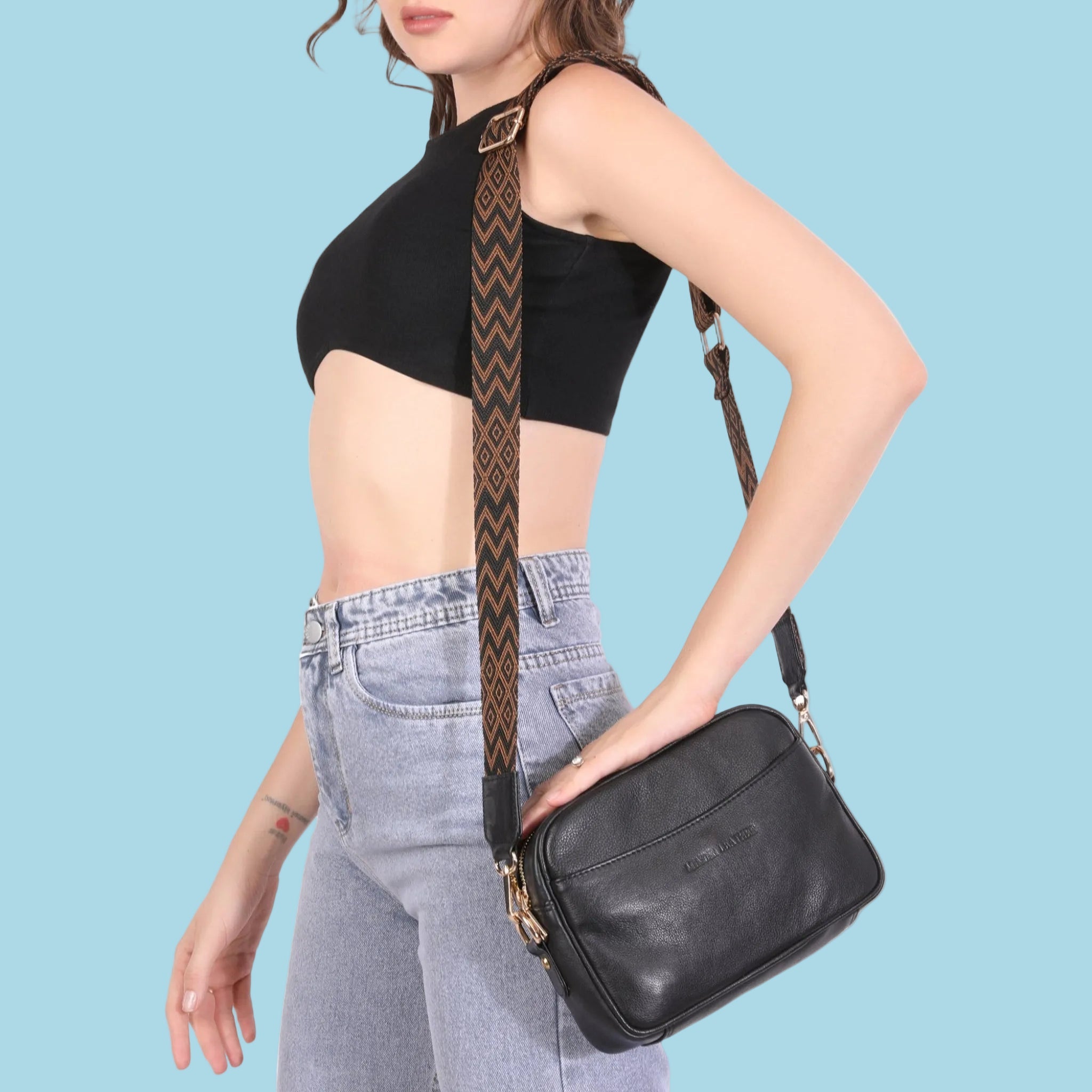 Black Evelyn leather crossbody bag for women by Minori Leather, featuring sleek design and adjustable strap.