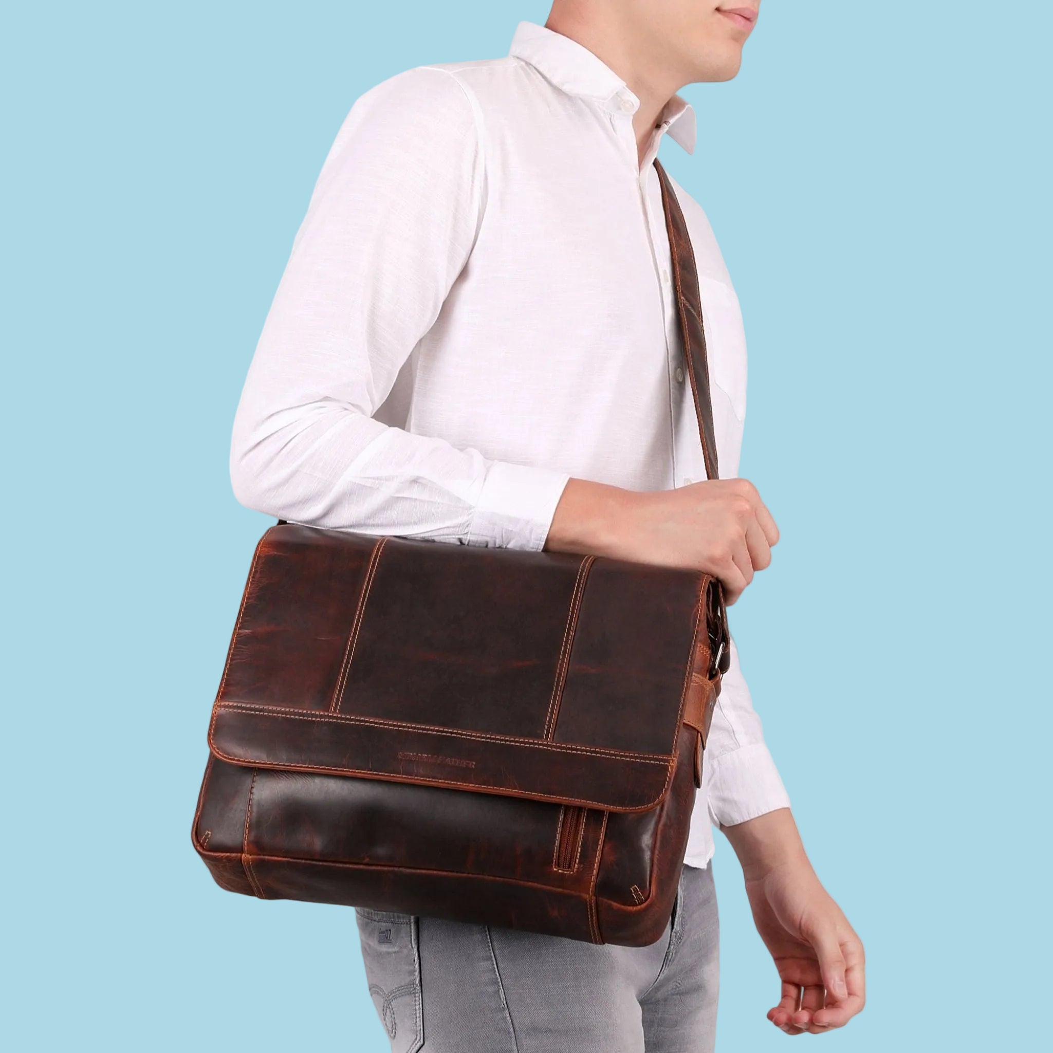 Jordan Leather Messenger Bag in Chestnut, a stylish Minori Leather laptop bag with adjustable strap and spacious interior.