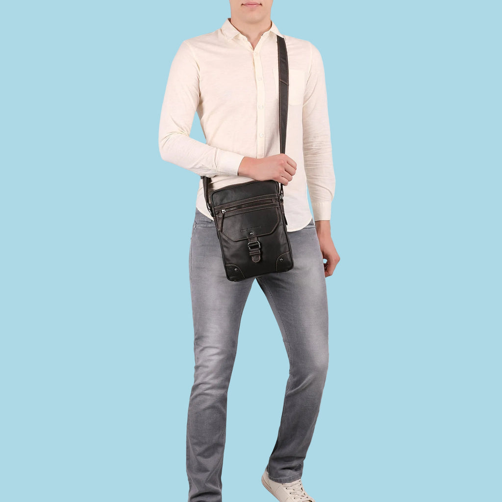 Brown Denver leather crossbody bag by Minori Leather, unisex style with adjustable strap and sleek design.