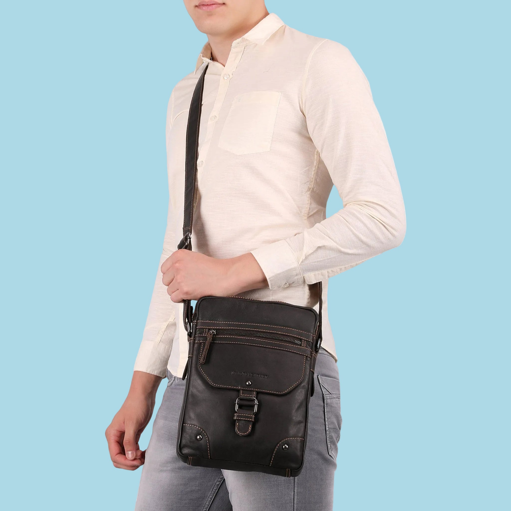 Brown Denver Leather Crossbody Bag by Minori Leather, unisex design with adjustable strap and multiple compartments.