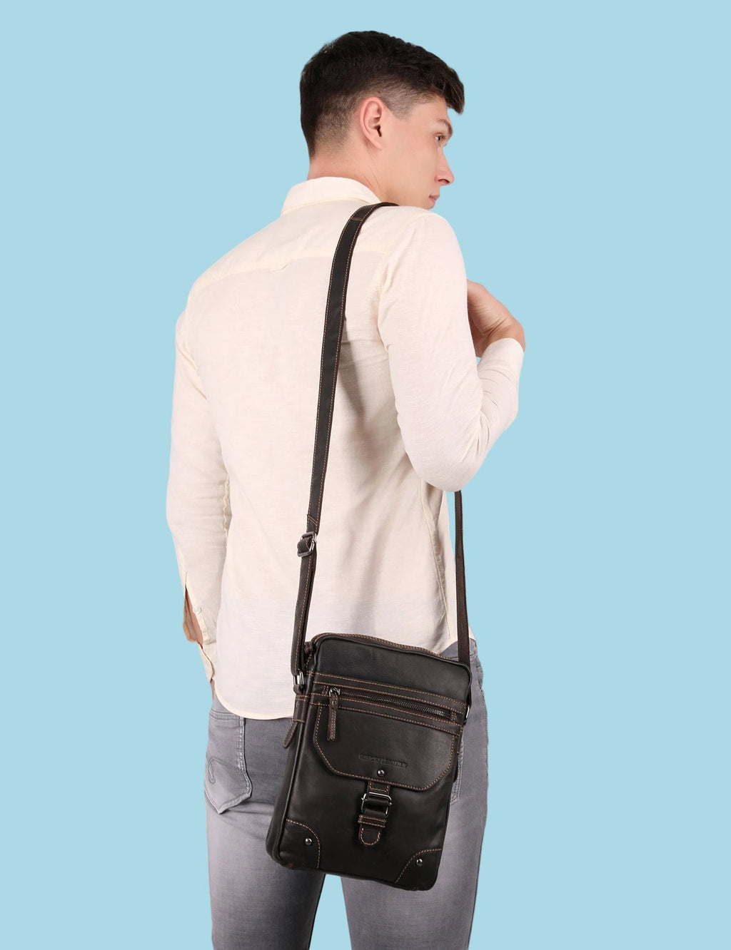 Brown Denver Leather crossbody bag by Minori Leather, unisex design with adjustable strap and sleek leather finish.