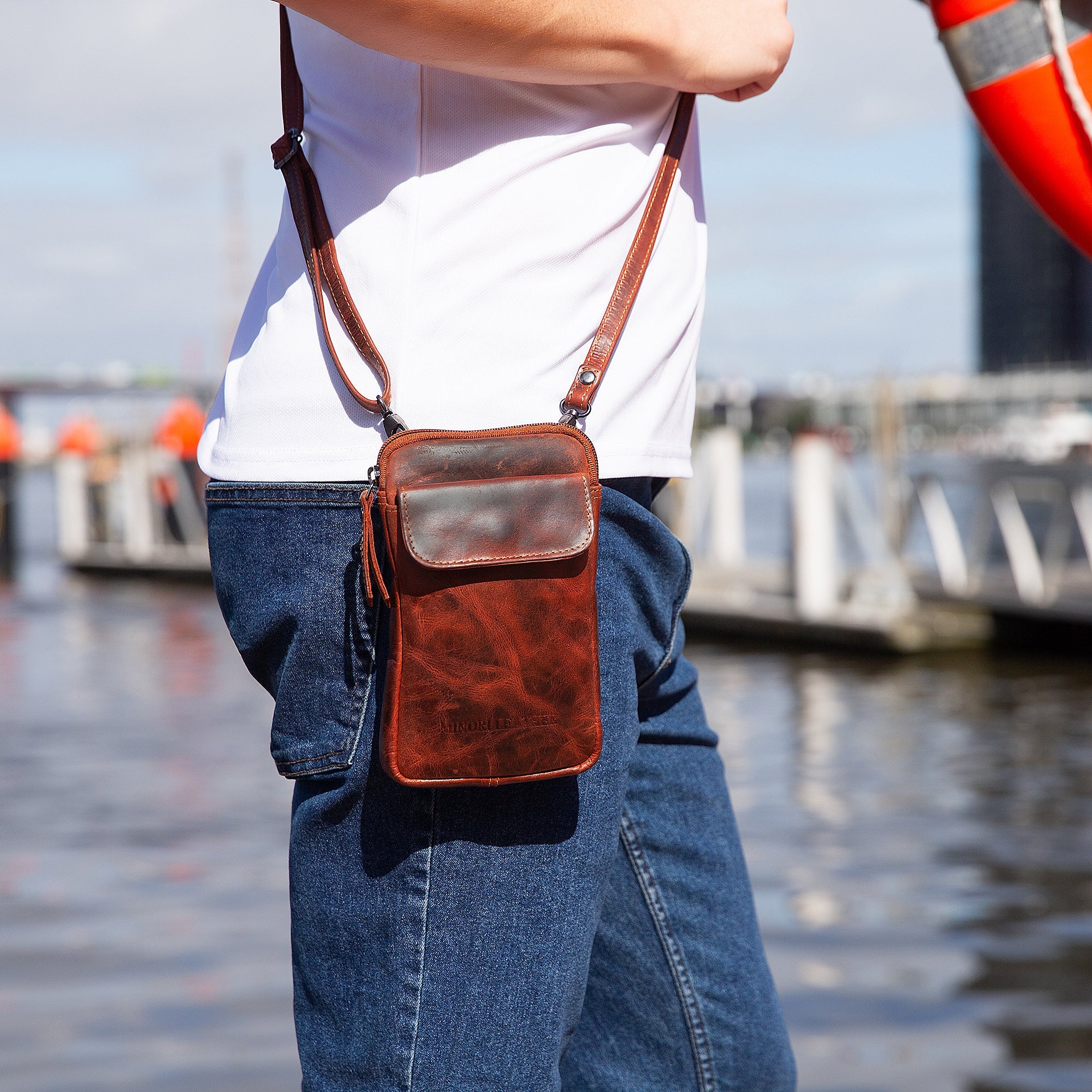 Unisex Freya Leather Sling Bag by Minori Leather in chestnut with adjustable strap and sleek design.