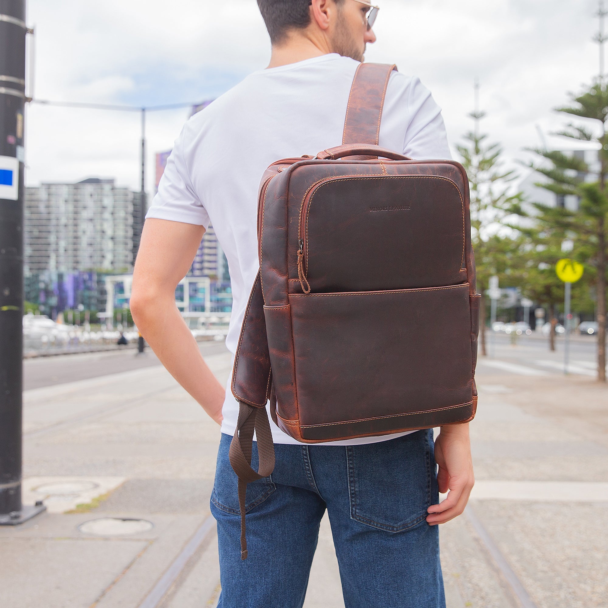 Brown Orlando Leather Backpack by Minori Leather, 16-inch unisex backpack with sturdy leather design and adjustable straps.