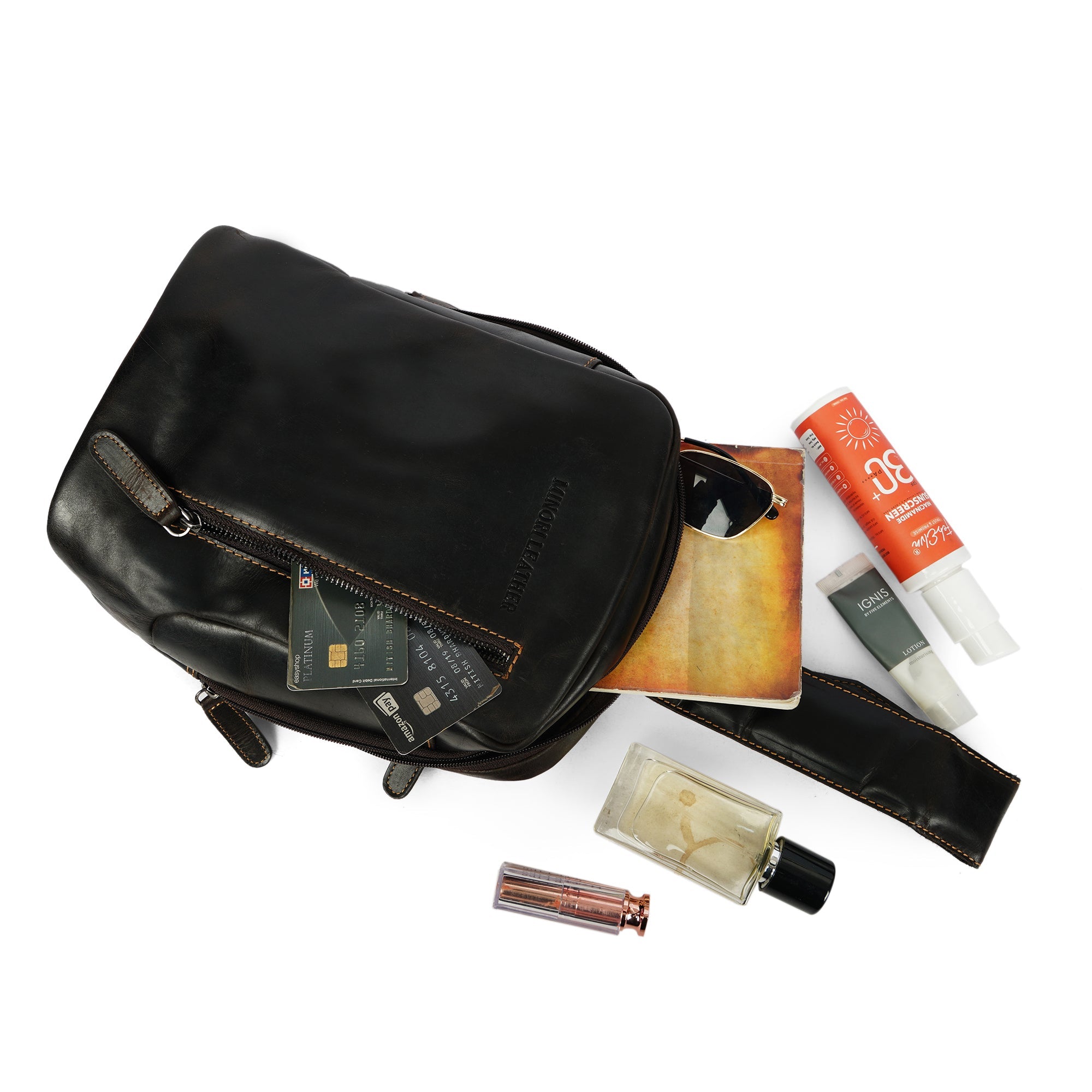 Brown Luxe Leather Sling Bag by Minori Leather, unisex crossbody bag with sleek design and adjustable strap.
