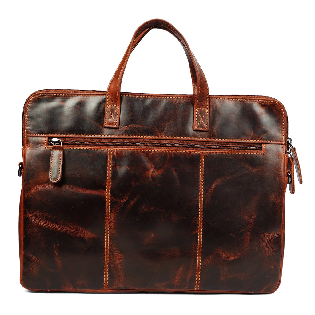 Minori Leather Atlas 14-inch chestnut leather laptop sleeve with sleek unisex design and durable craftsmanship.