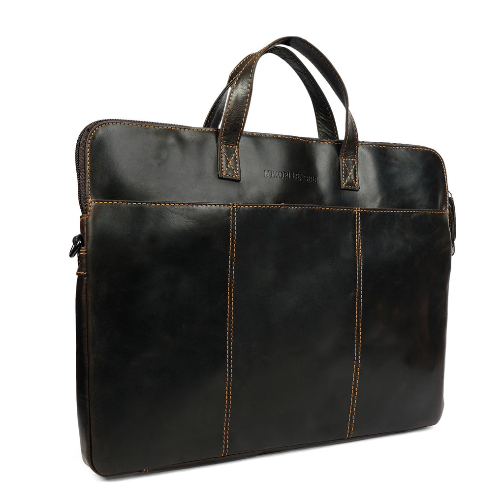 Brown Minori Leather Atlas 14-inch unisex laptop sleeve with sleek leather exterior and minimalistic design.