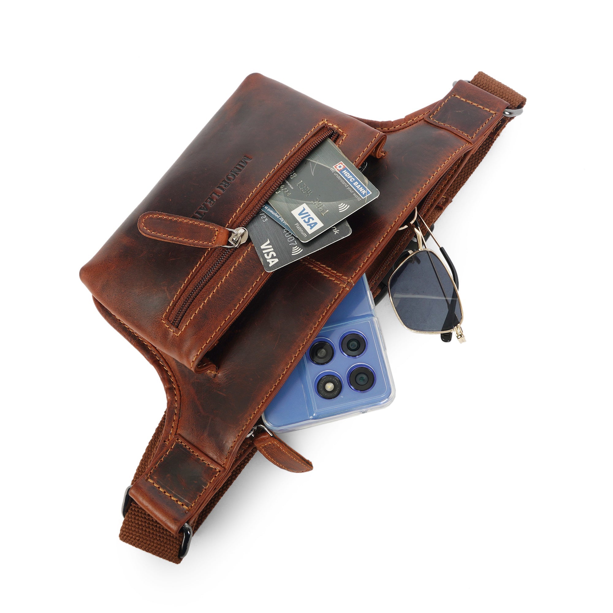 Minori Leather Osaka leather belt bag in chestnut color, unisex fanny pack with adjustable strap and compact design.