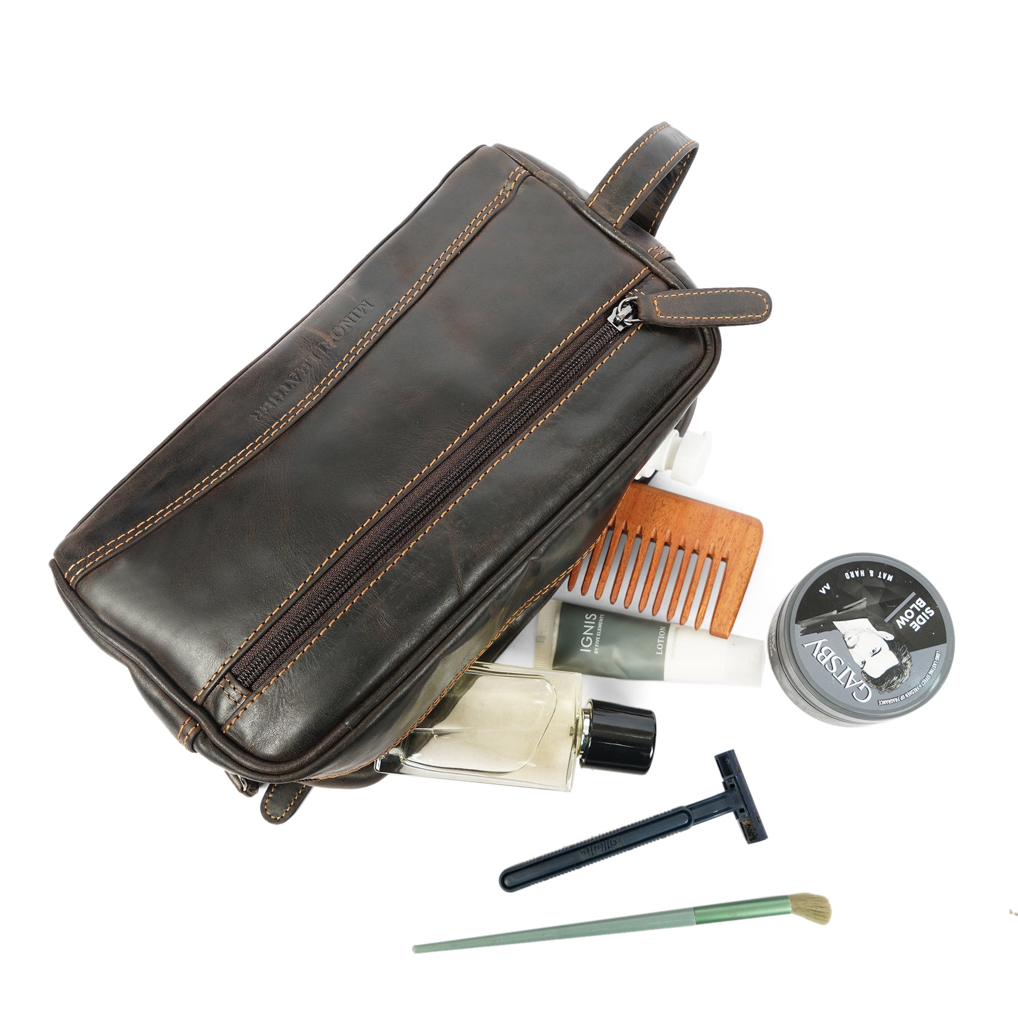 Brown Minori Leather men's toiletry bag with premium leather construction and compact design for travel storage.