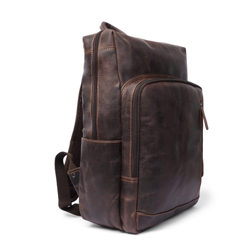 Minori Leather Oslo leather laptop backpack with 15.6-inch compartment, featuring a sleek design and durable leather construction.