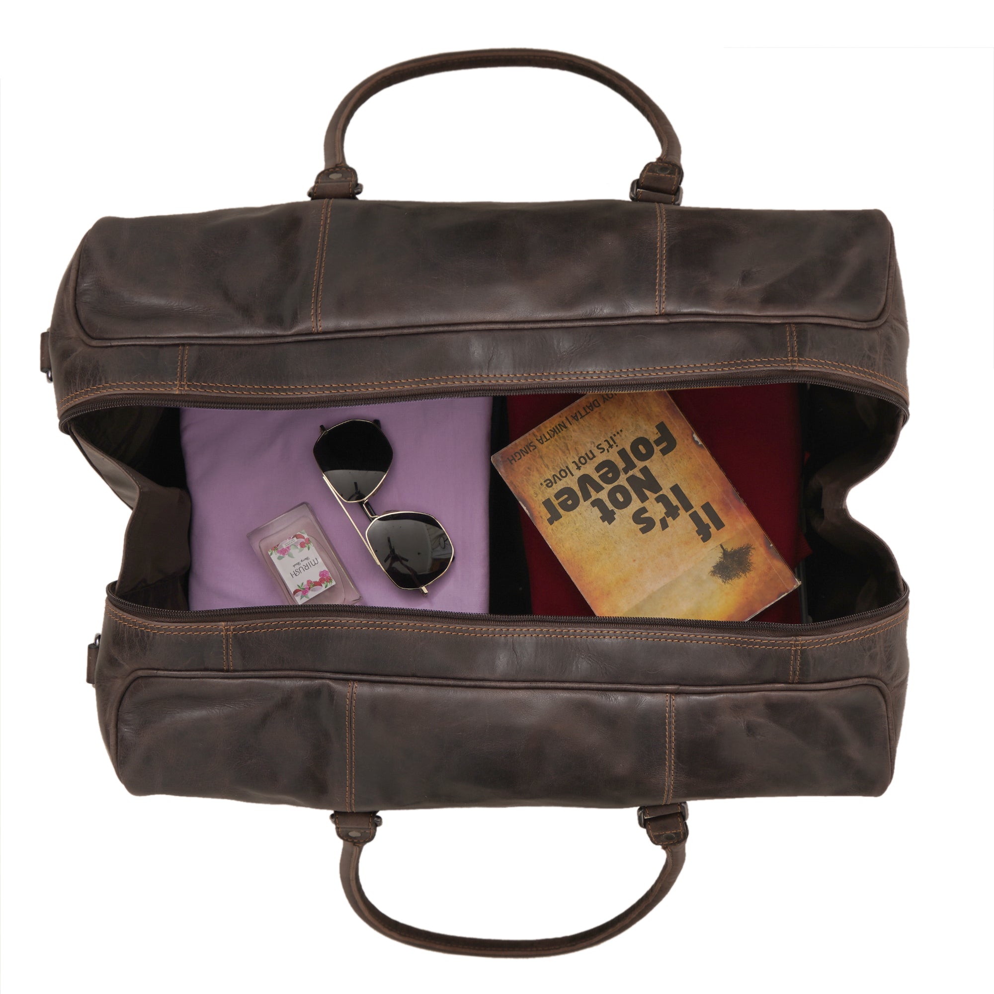 Brown Riley Leather Duffle Bag by Minori Leather with sturdy handles and spacious interior, designed for travel and weekend trips.