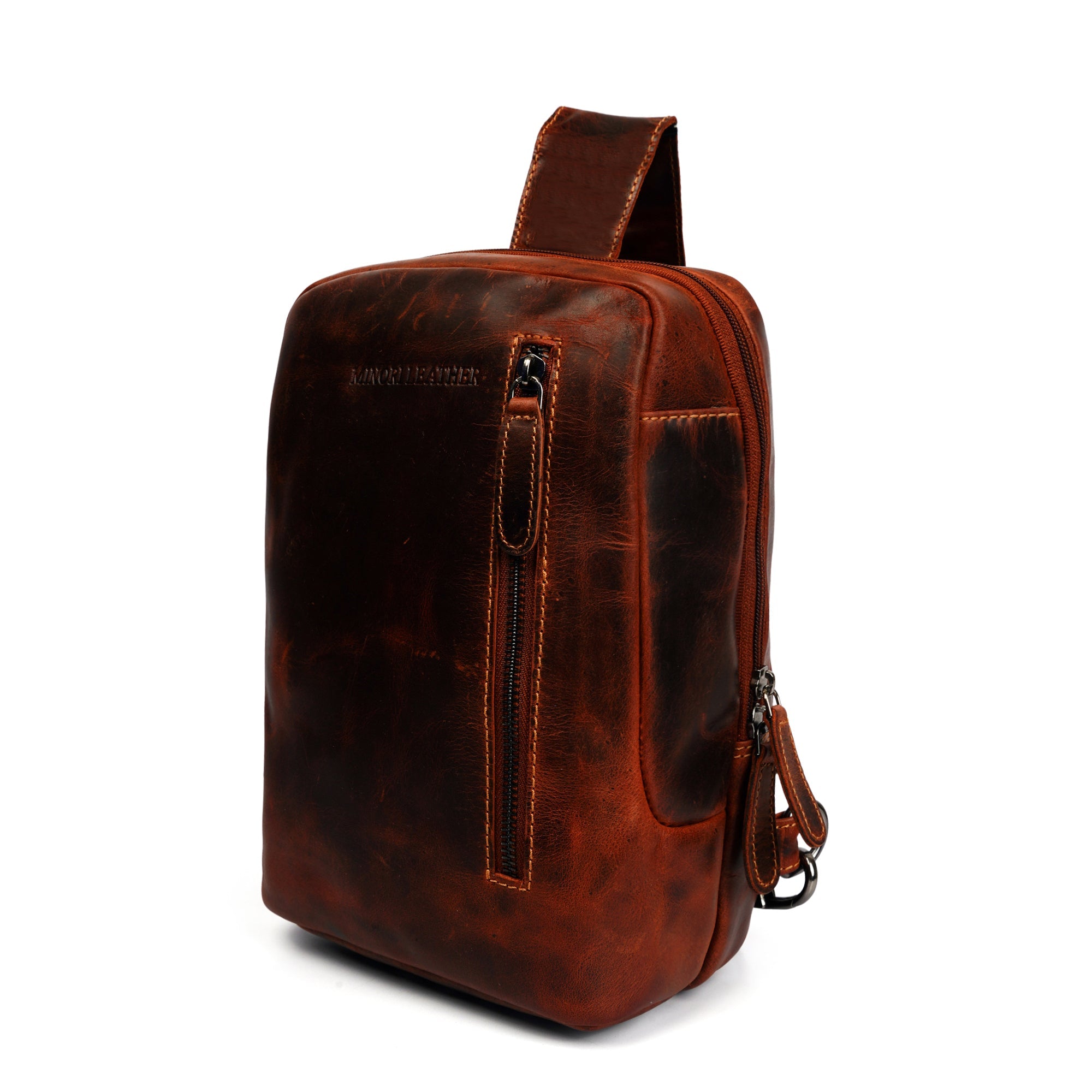 Minori Leather Luxe Leather Sling Crossbody Bag in Chestnut with adjustable strap and sleek design.