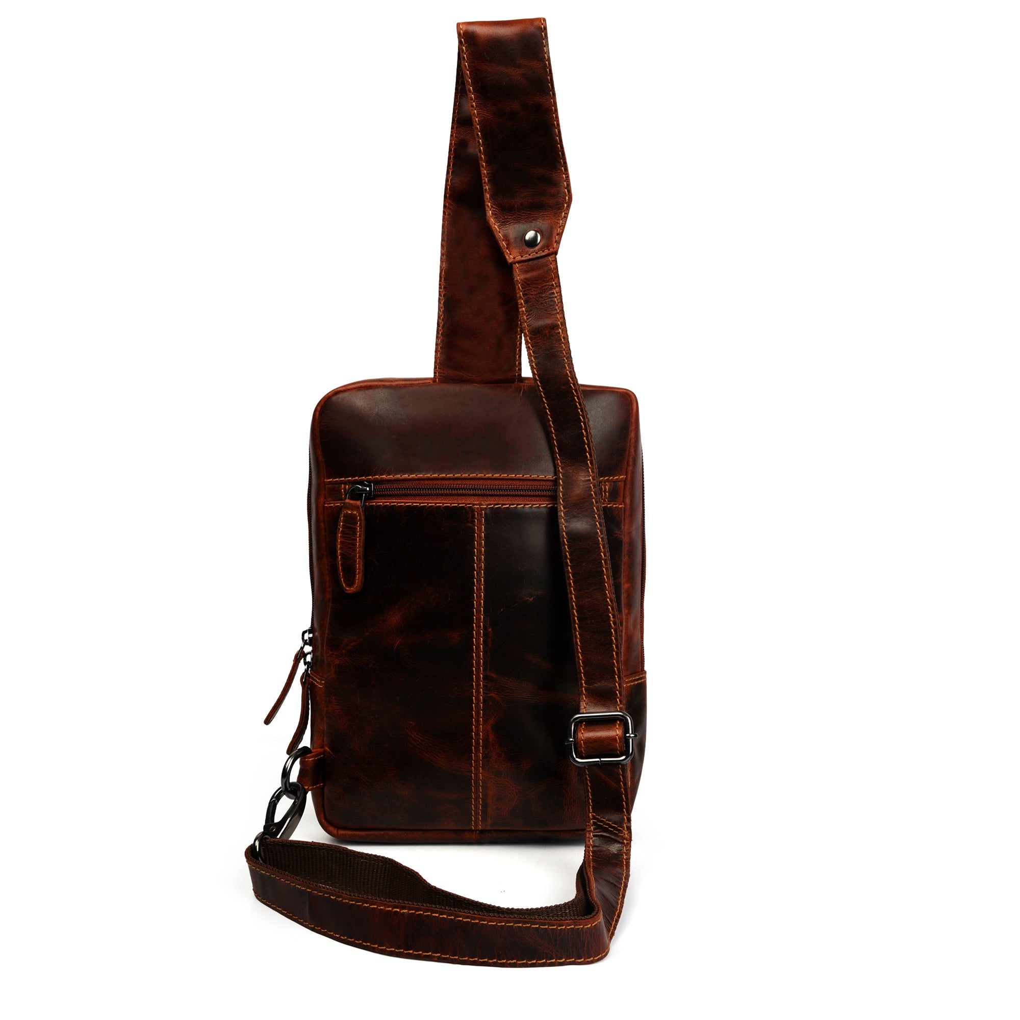 Minori Leather Luxe Leather Sling Crossbody Bag in chestnut with adjustable strap and sleek design, close-up view of the bag's leather texture.
