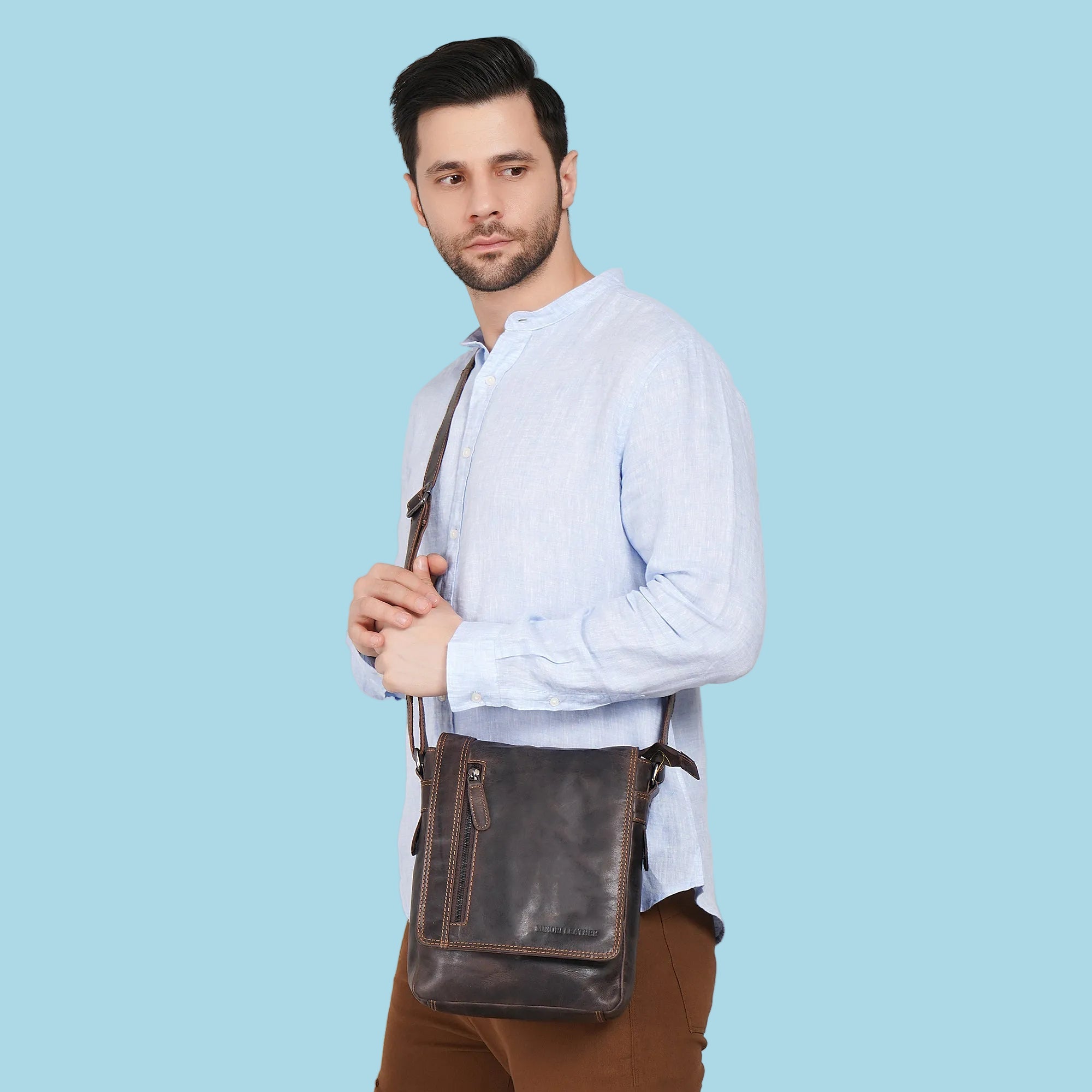 Minori Leather Knox leather crossbody bag with adjustable strap and sleek design, perfect for everyday use.