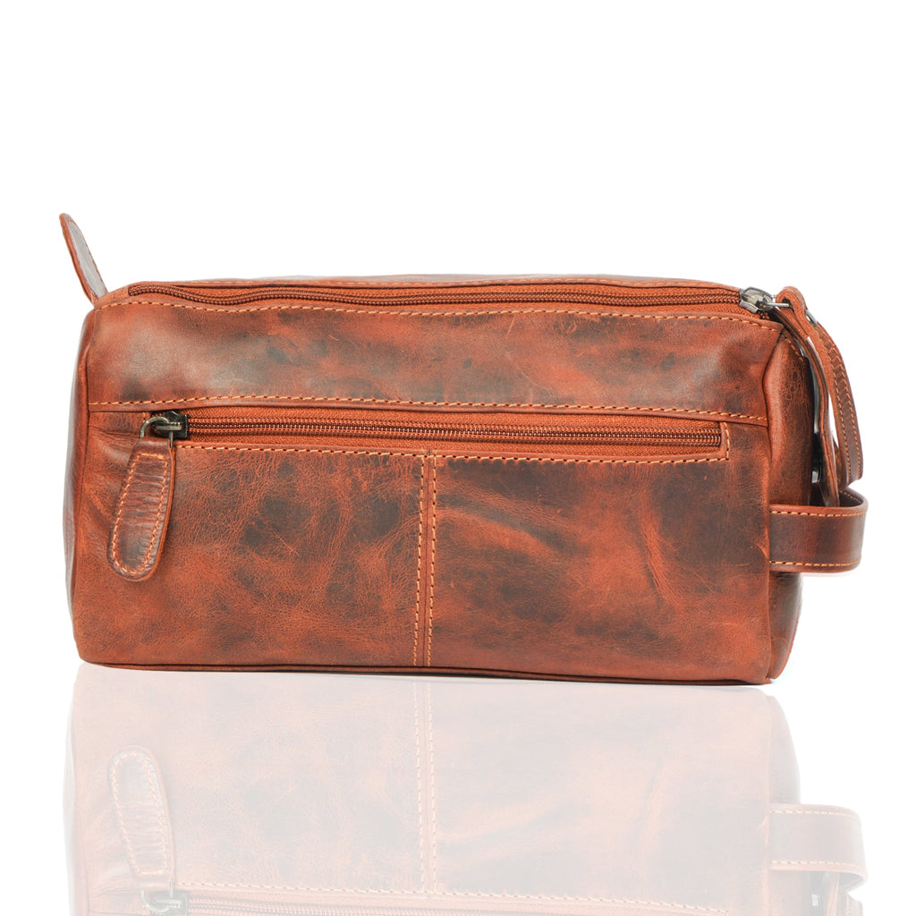 Minori Leather premium chestnut leather toiletry bag for men with zipper closure and compact design.