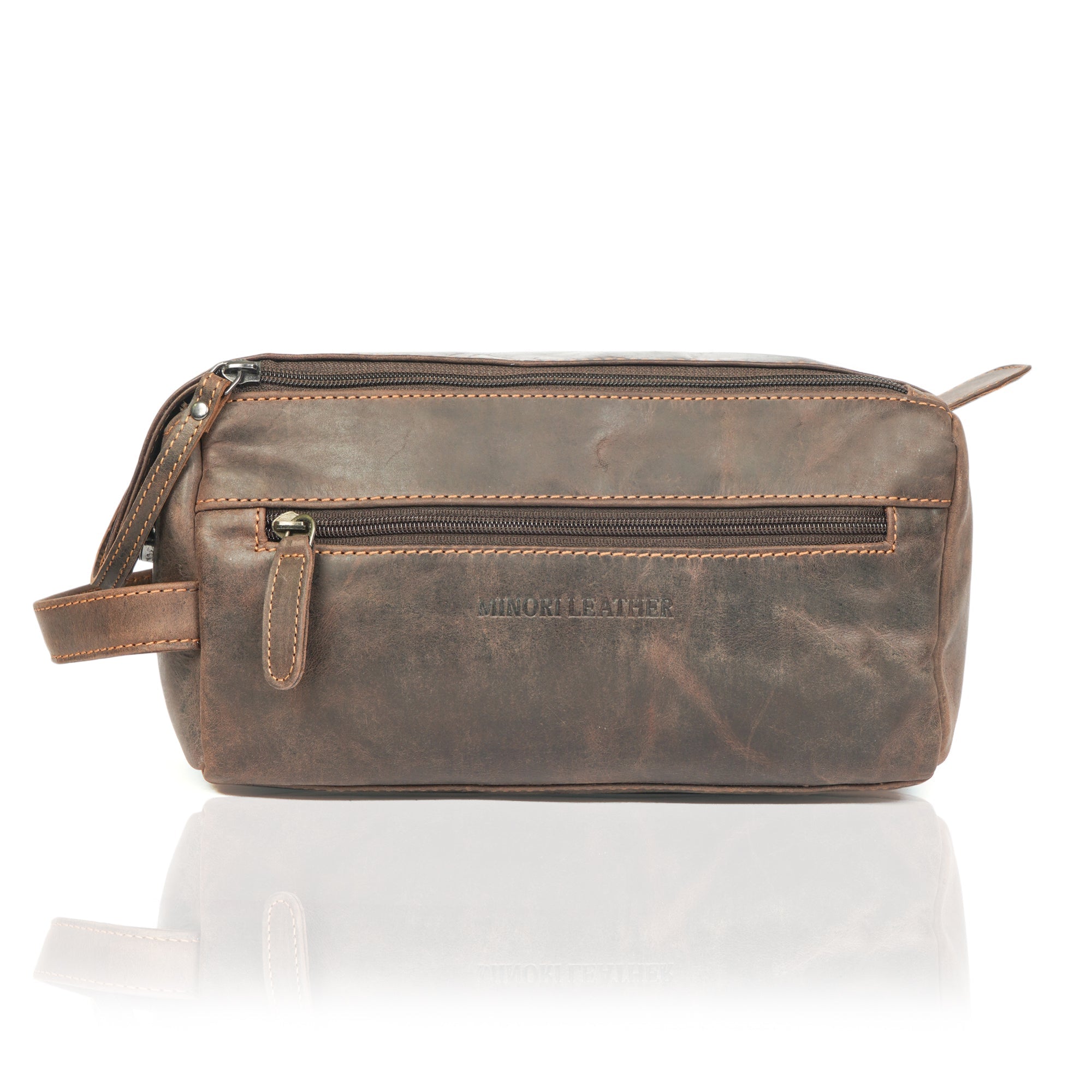 Brown premium leather toiletry bag for men by Minori Leather, featuring a sleek, durable design with multiple compartments.