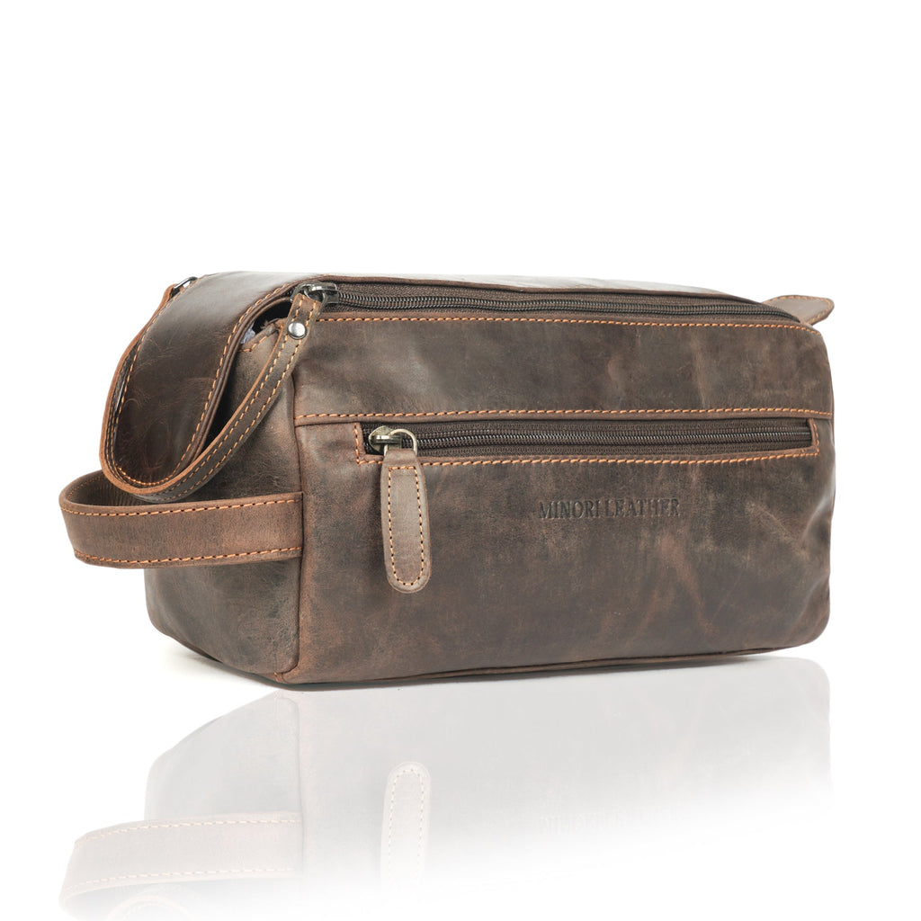 Brown leather toiletry bag for men by Minori Leather, featuring a sleek, premium design for travel and grooming essentials.