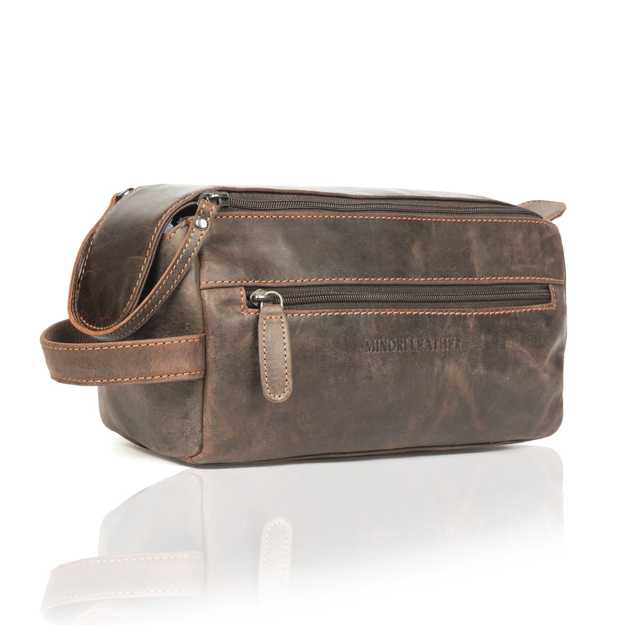 Brown leather toiletry bag for men by Minori Leather, featuring a sleek, premium design for travel and grooming essentials.