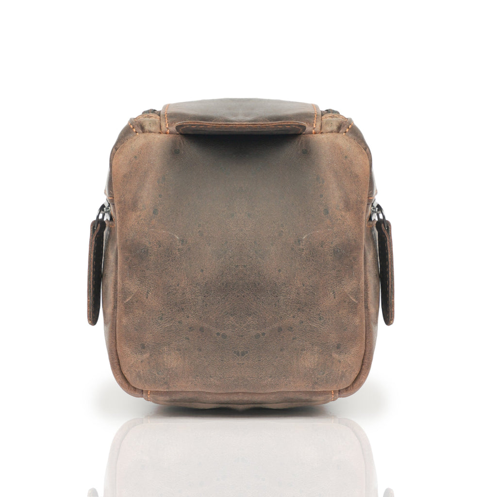 Brown premium leather toiletry bag for men by Minori Leather, featuring organized compartments and durable design.
