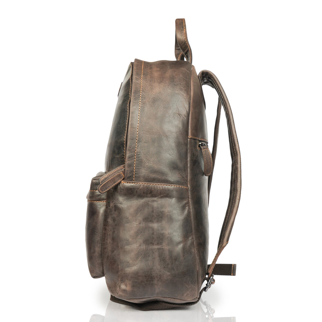Minori Leather Garth Leather Backpack with adjustable straps and multiple compartments, shown in brown leather.