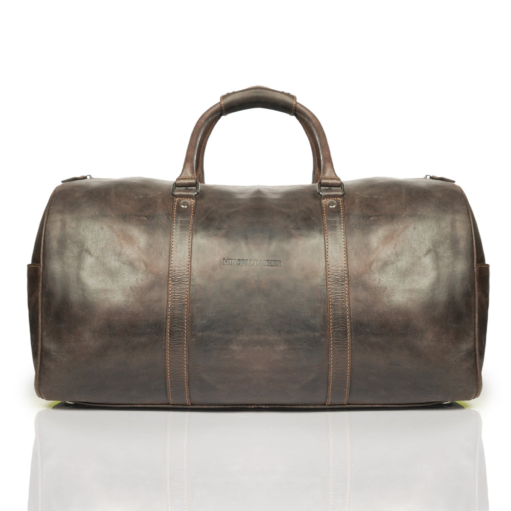 Minori Leather Jackson Leather Weekender Duffle Bag with sturdy handles and spacious interior for travel and weekend trips.