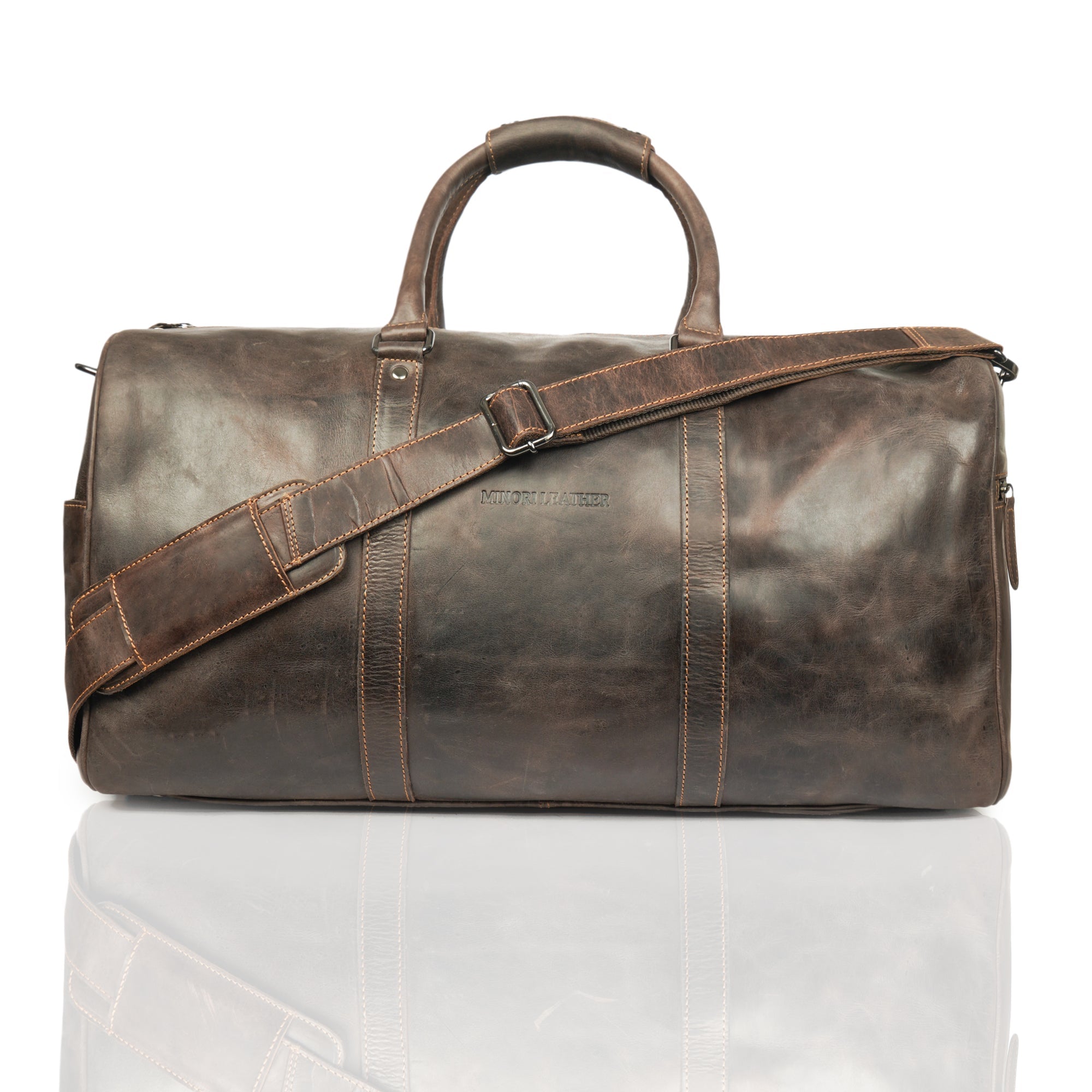 Minori Leather Jackson Leather Weekender Duffle Bag with sturdy handles and spacious interior, ideal for travel and weekend trips.