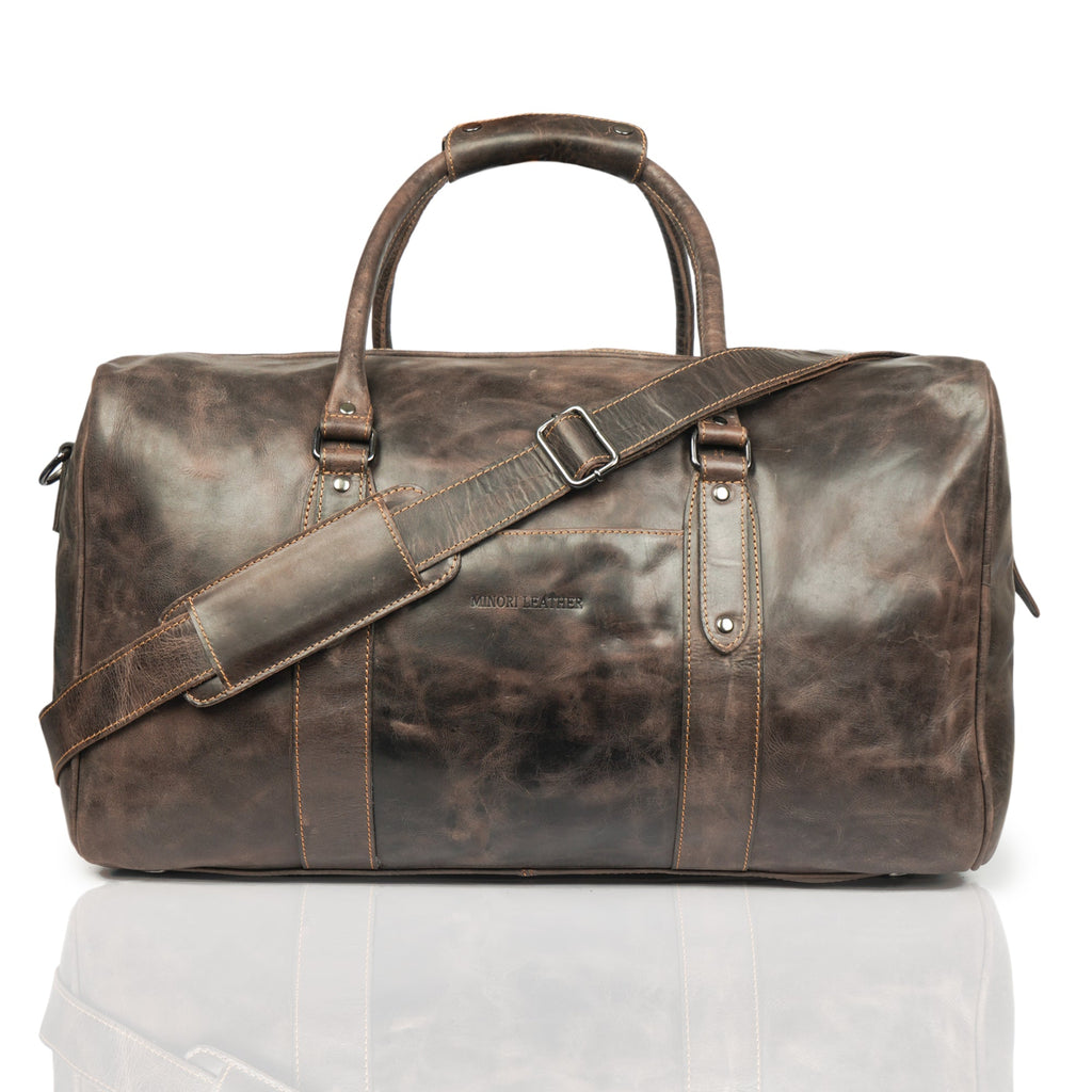 Brown Riley Leather Duffle Bag by Minori Leather with sturdy handles and spacious interior for travel or weekend trips.