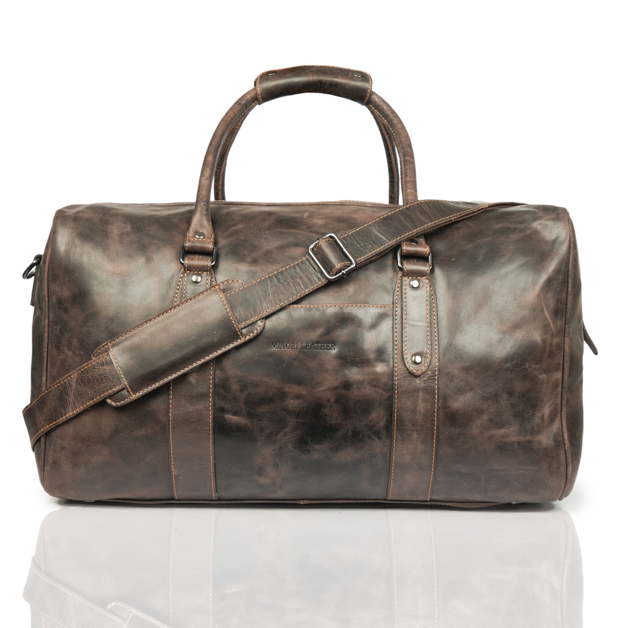 Brown Riley Leather Duffle Bag by Minori Leather with sturdy handles and spacious interior for travel or weekend trips.