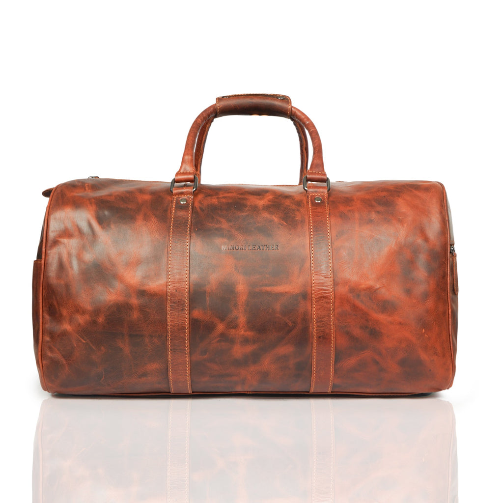 Minori Leather Jackson leather weekender duffle bag with sturdy handles and spacious interior for travel and weekend trips.