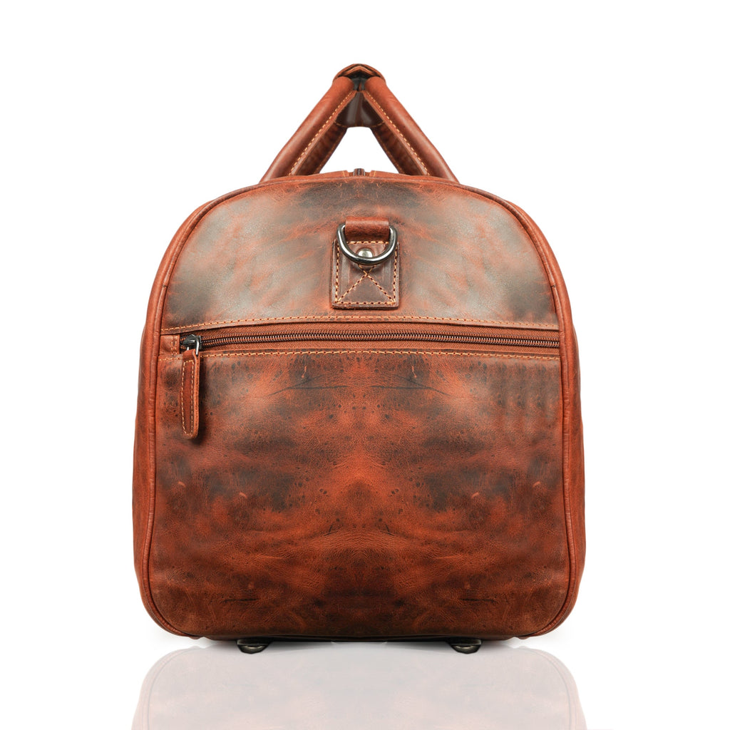 Minori Leather Jackson leather weekender duffle bag with sturdy handles and spacious interior, ideal for travel and weekend trips.