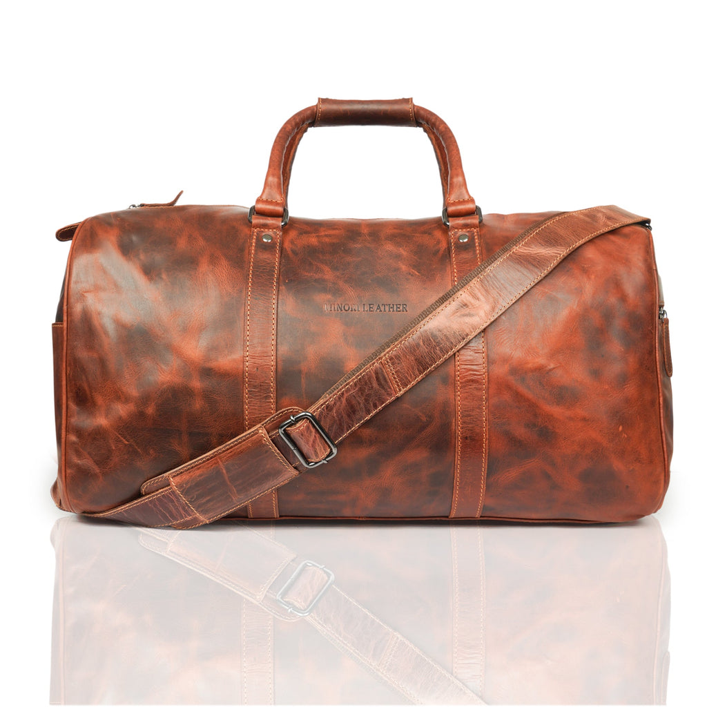 Minori Leather Jackson leather weekender duffle bag with sturdy handles and spacious interior for travel and weekend trips.