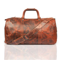Minori Leather Jackson leather weekender duffle bag with sturdy handles and spacious interior for travel and weekend trips.